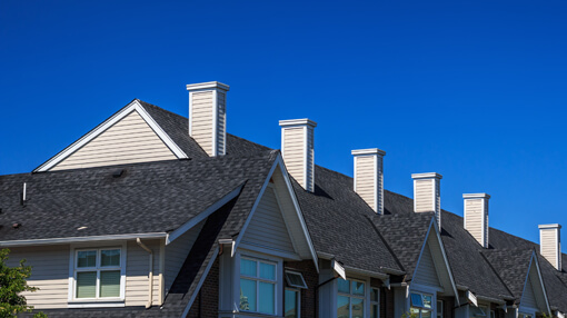 Roofs of condos/townhomes showing newly installed roofs