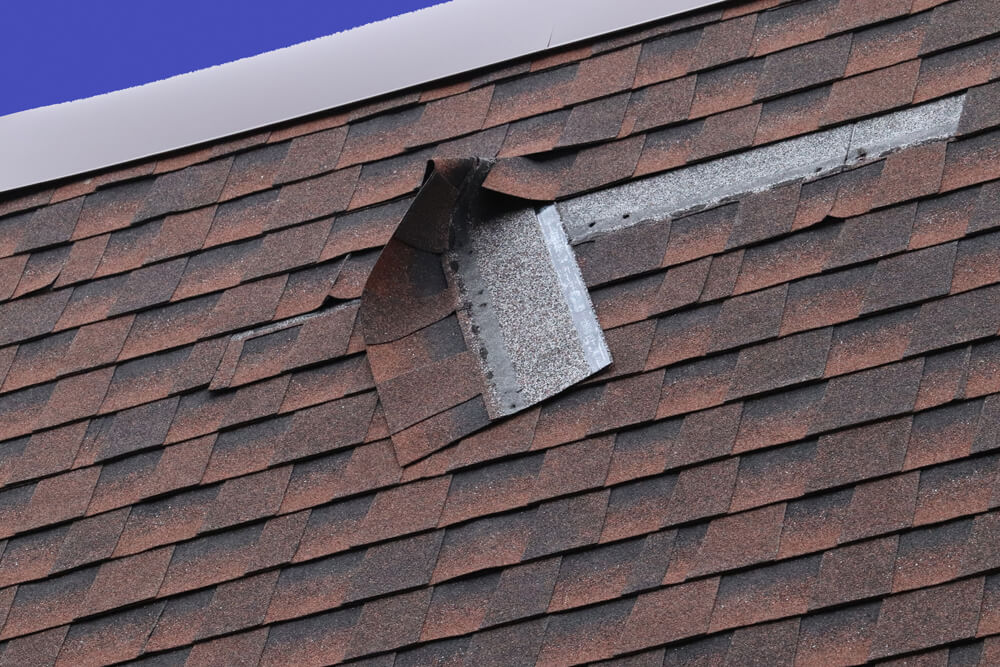 Asphalt roof shingle falling off