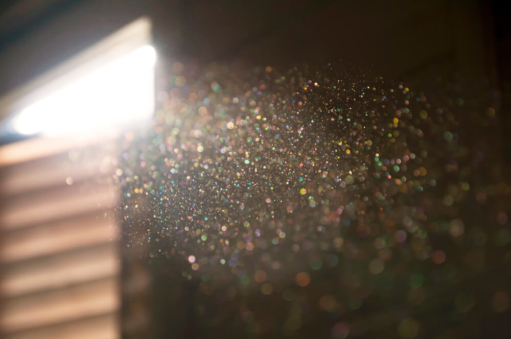 Light coming into an attic through a hole in the roof